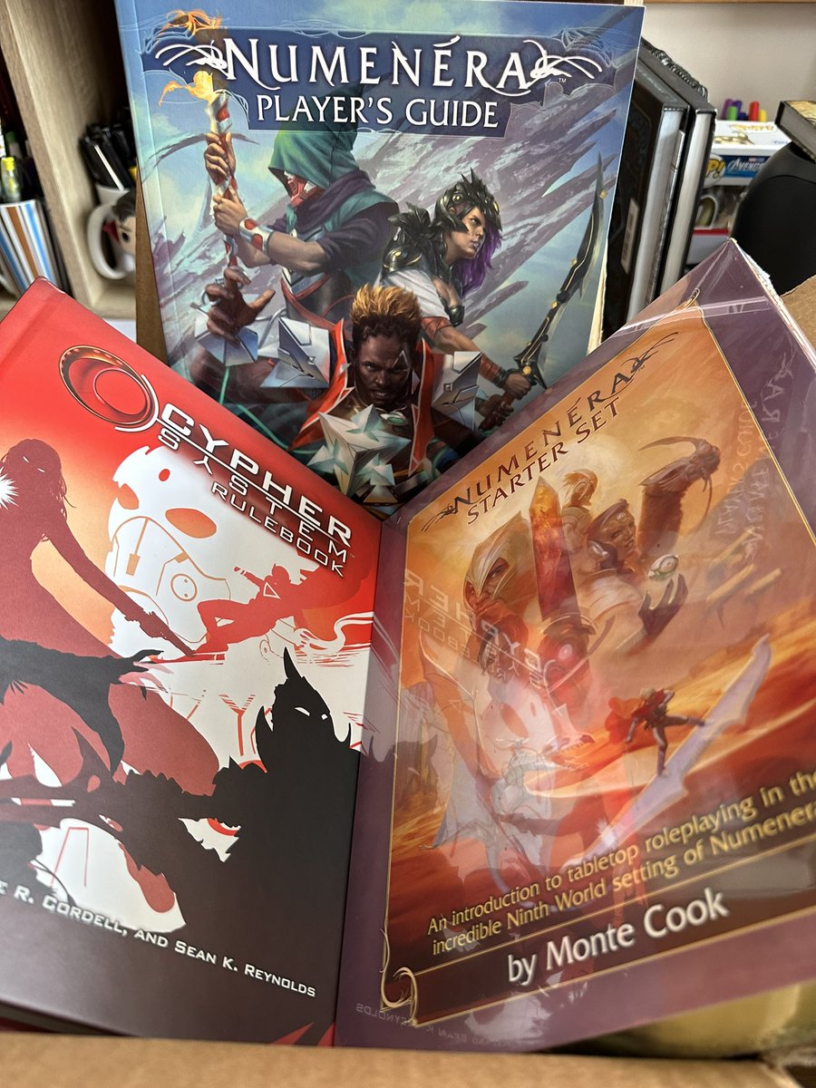 Something arrived… not just any something!! Cypher System, which is a mighty tome indeed! Numenera Starter Set and Player Handbook from @MonteCookGames … more photos to follow 🤗 

#OpenDnD #OpenRPG #TTRPGcommunity #EveryRPG  #AlternateRPG #AlternateGM #TTRPGrising