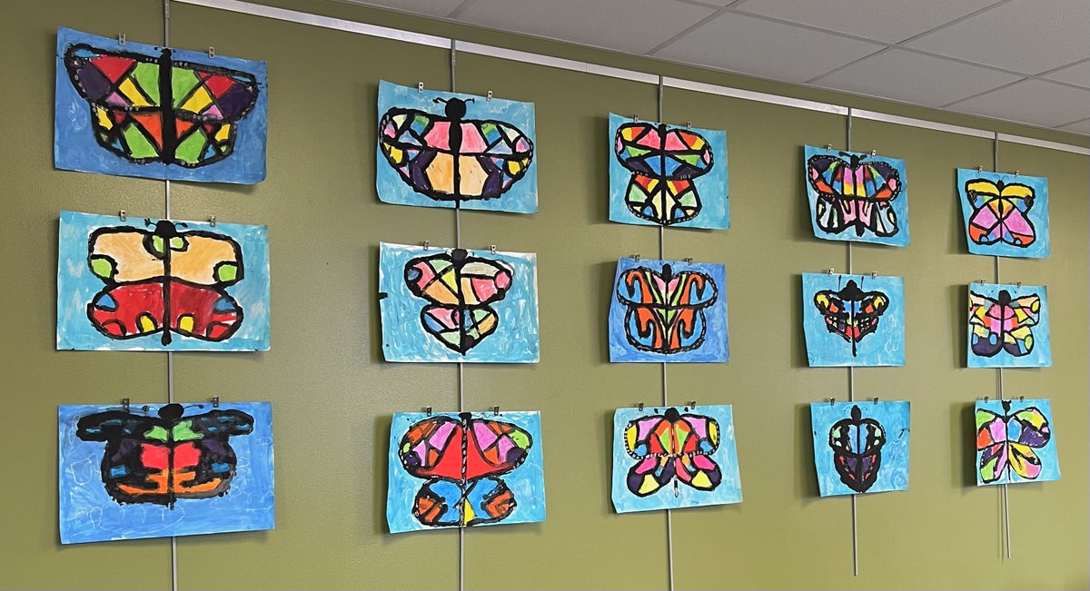 troyunion_art's tweet photo. Our first graders learned about symmetry while creating these beautiful butterflies! Students learned a fold and press printing technique to transfer their design to the other side of their paper. Check them out in the TU office! https://t.co/LchEMae4je