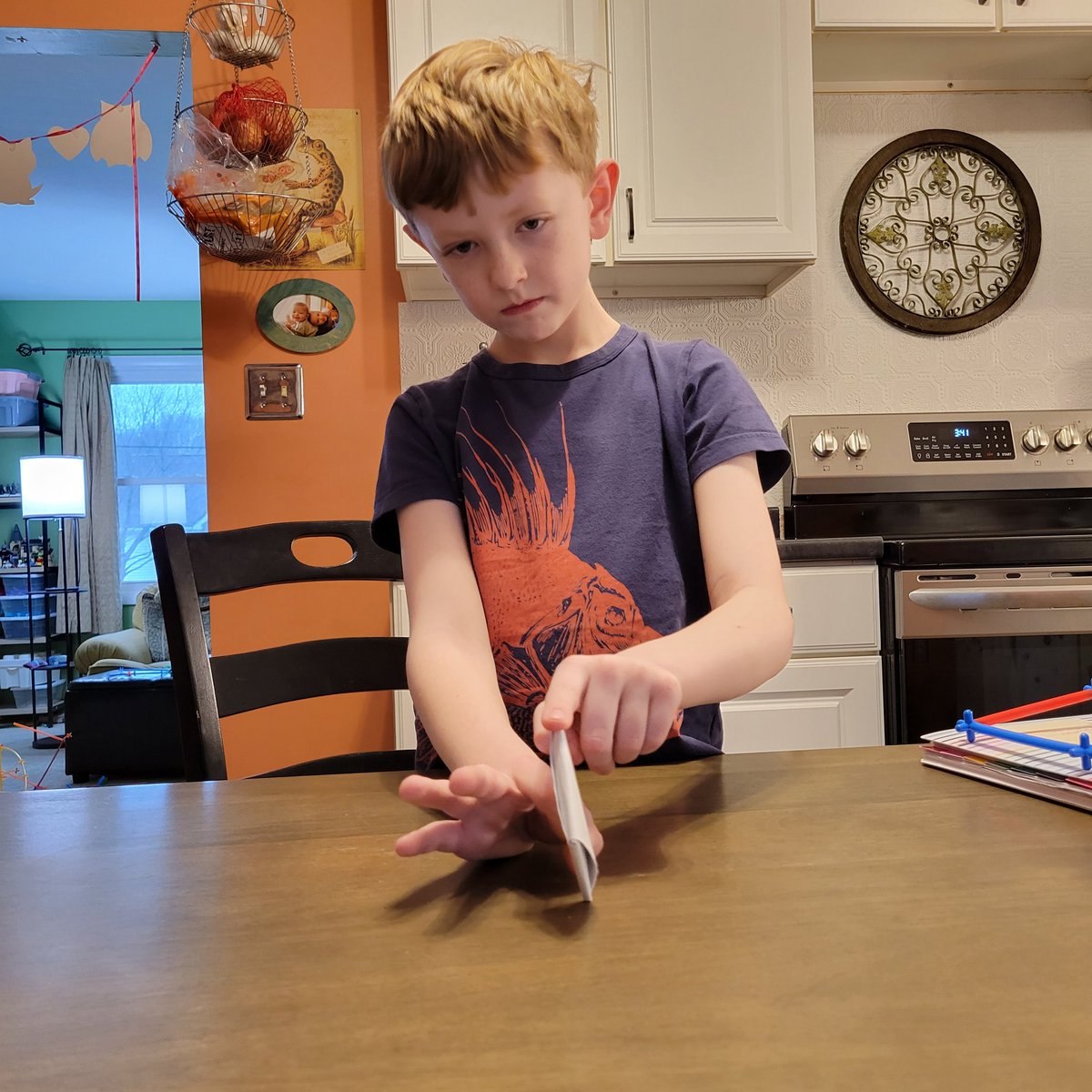 LaxFactor's tweet photo. Pregaming for Cuse while teaching the boy #PaperFootball... https://t.co/RXuE1bPui7
