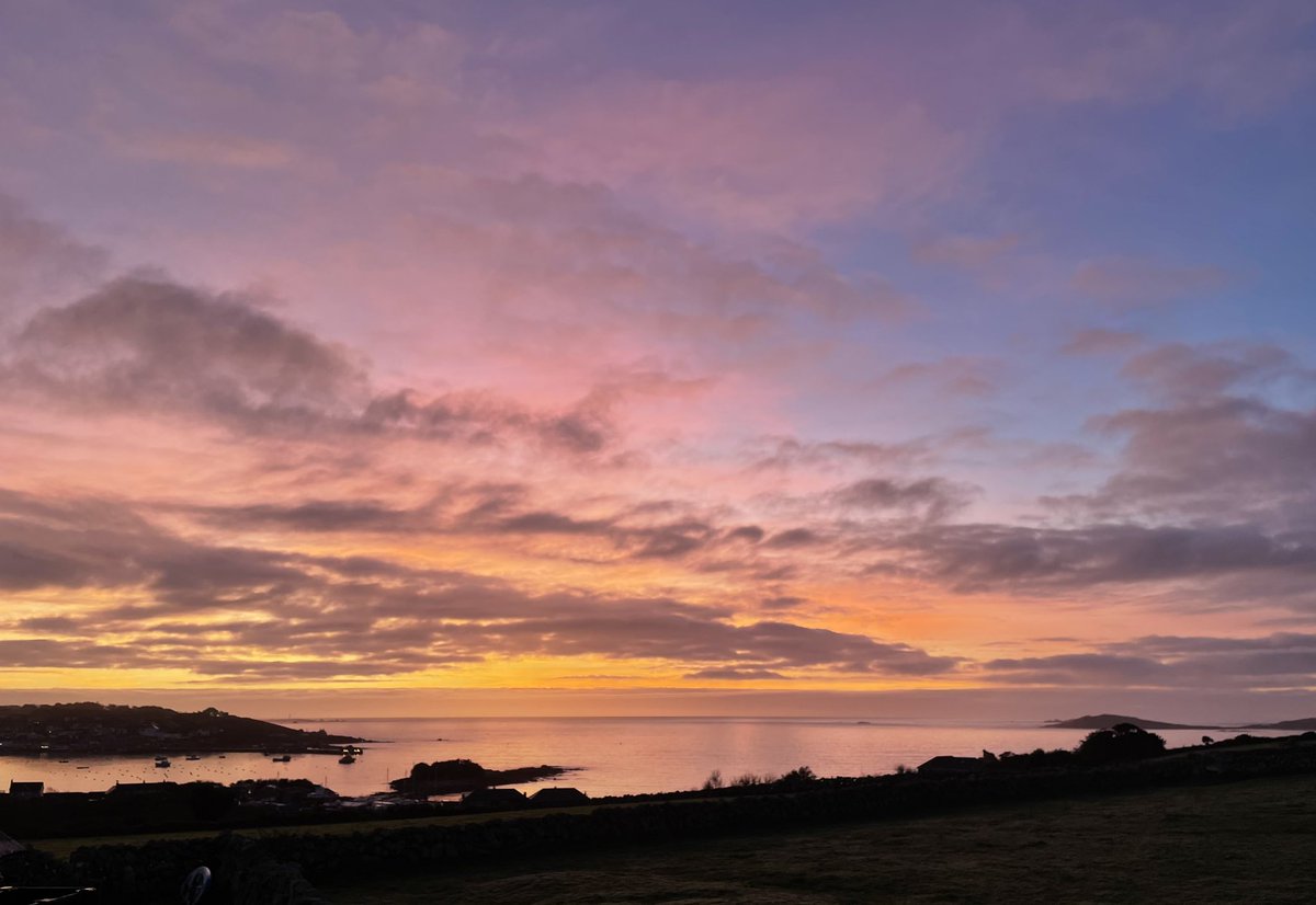 The fog finally cleared to a purple and gold sunset #Scilly