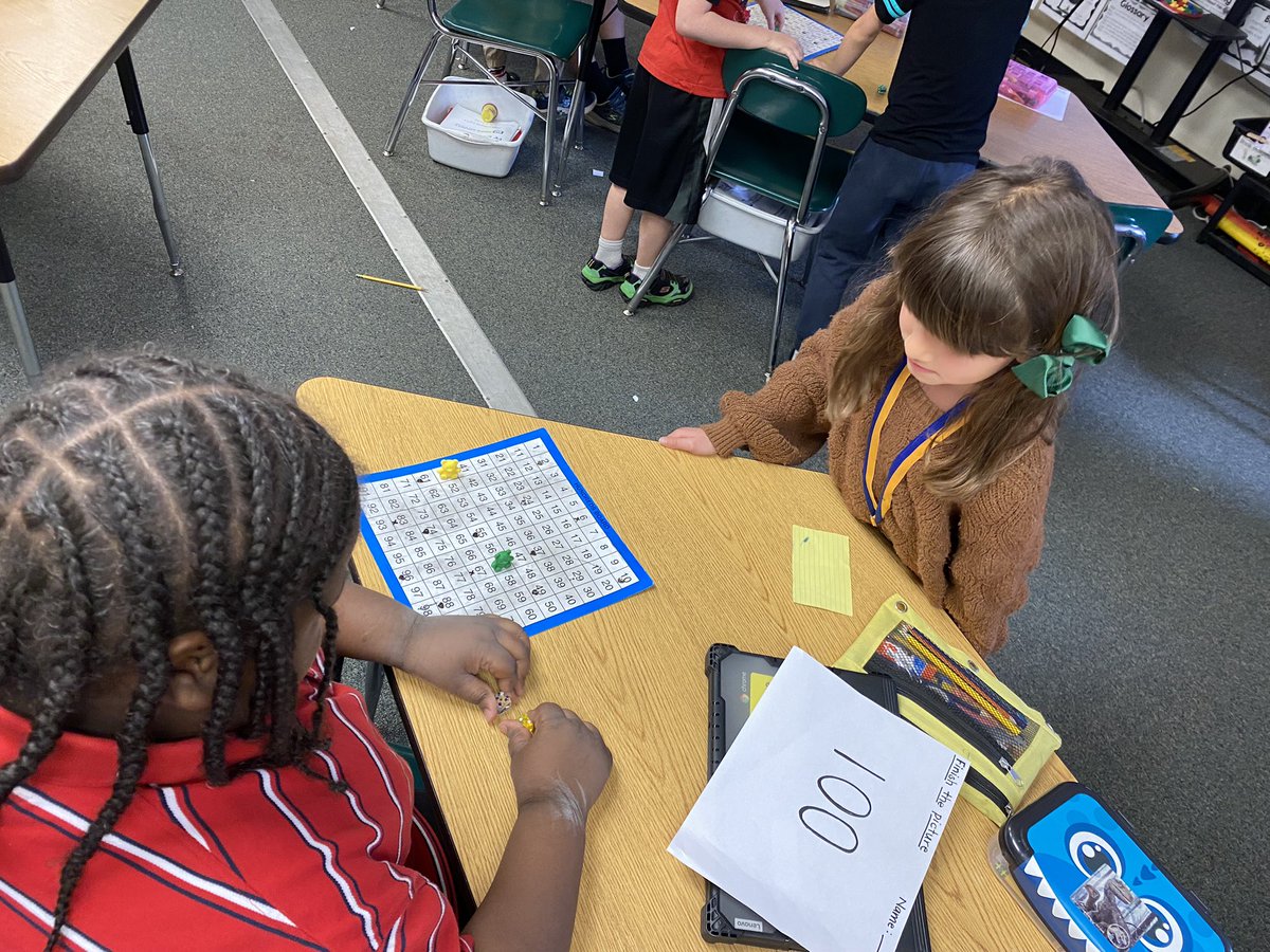 We are 💯 days smarter! We celebrated by playing the race to 100 math game!
