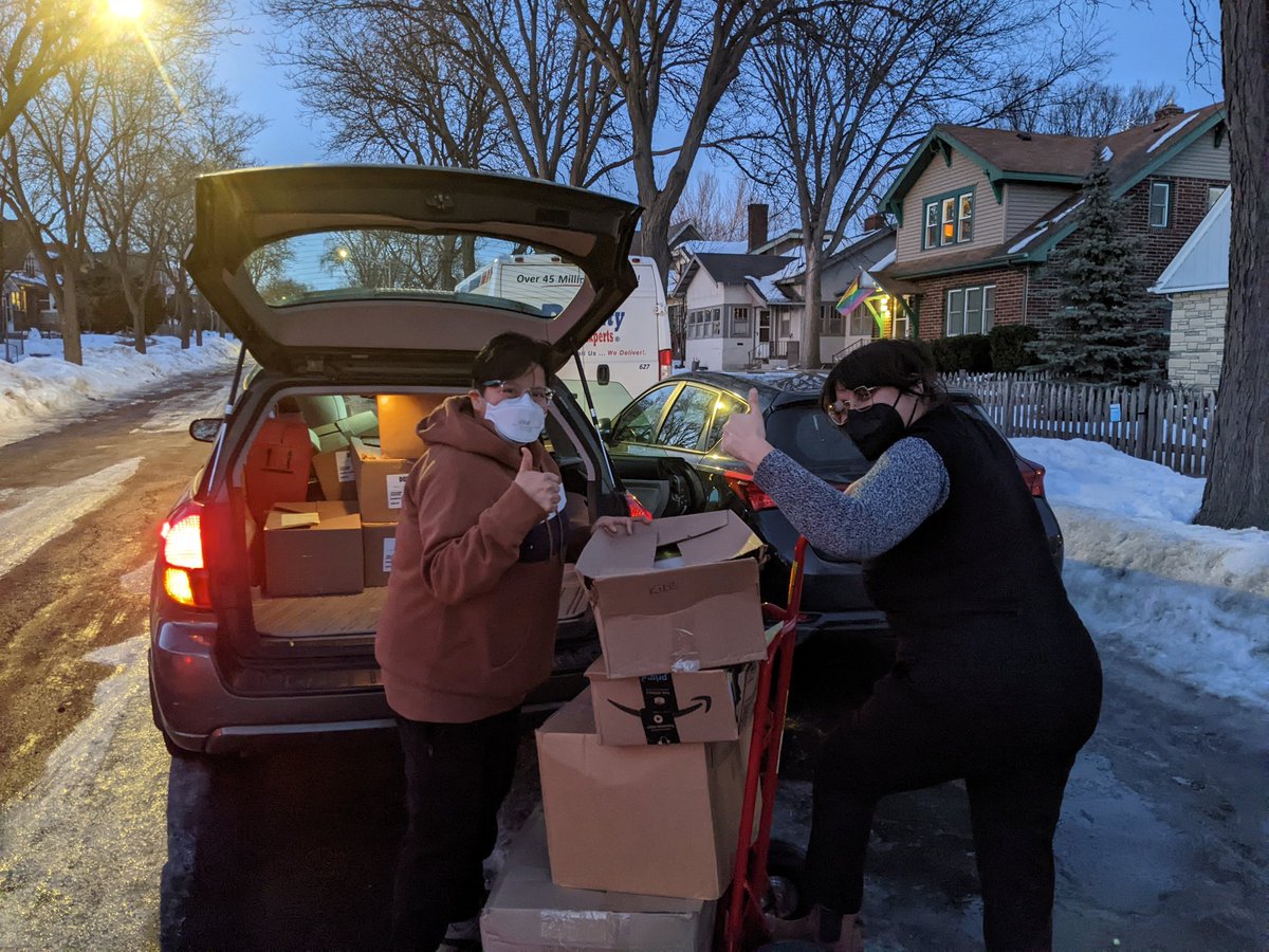TwinCitiesGeeks's tweet photo. Kai and Aliya with @WPBP braved icy #Minneapolis streets this evening to unload this year's massive #GiveTCG book donation! Congratulations to all and thanks for helping spread access to books! https://t.co/VT3BdeqenS