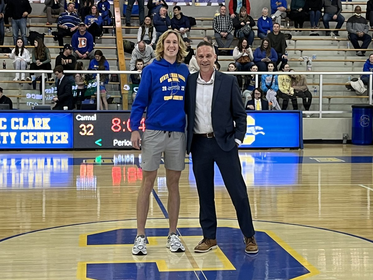carmelathletics's tweet photo. Kole Mathison sinks the halftime half court shot contest and then turns around to be recognized as the National Cross Country Champion at the San Diego Meet! Greyhound Legend! https://t.co/hRdzpb039d