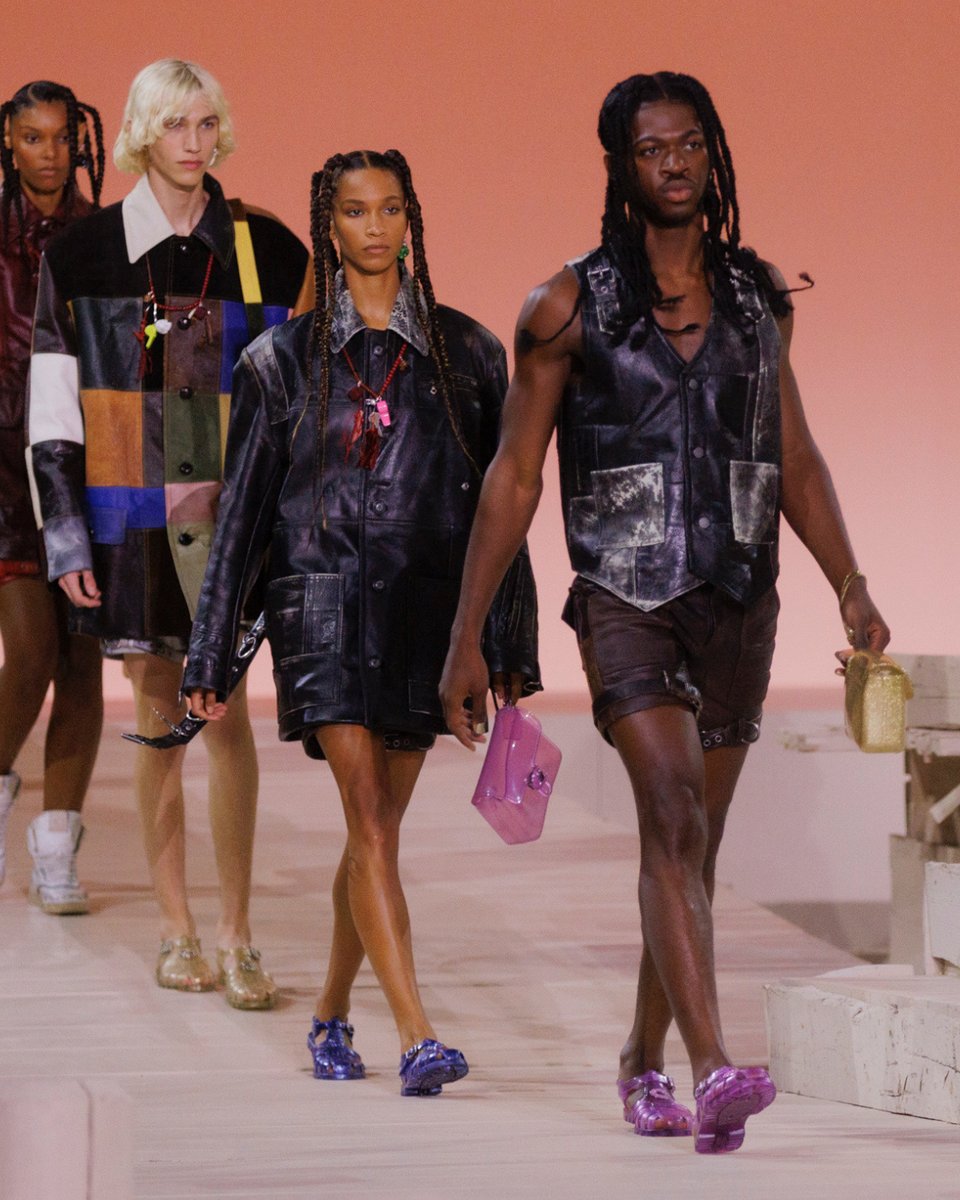 Coach's tweet photo. Jelly was ✨ the moment ✨on the #CoachSpring23 runway. Making us wonder: what will be the star of #CoachFall23? (PSA: our jelly bags and sandals arrive in stores on 3/2.) #NYFW #CoachNY https://t.co/KdP9DlKHYl