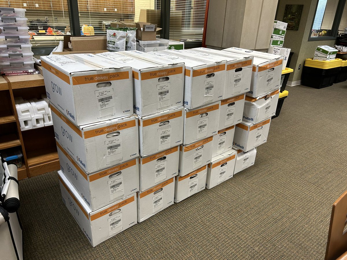rsi_library's tweet photo. Well look what arrived today - replacement books from out December flood. Now, to get them on the shelves so students can begin reading them. @RSIHawks https://t.co/TWsN71JGJE
