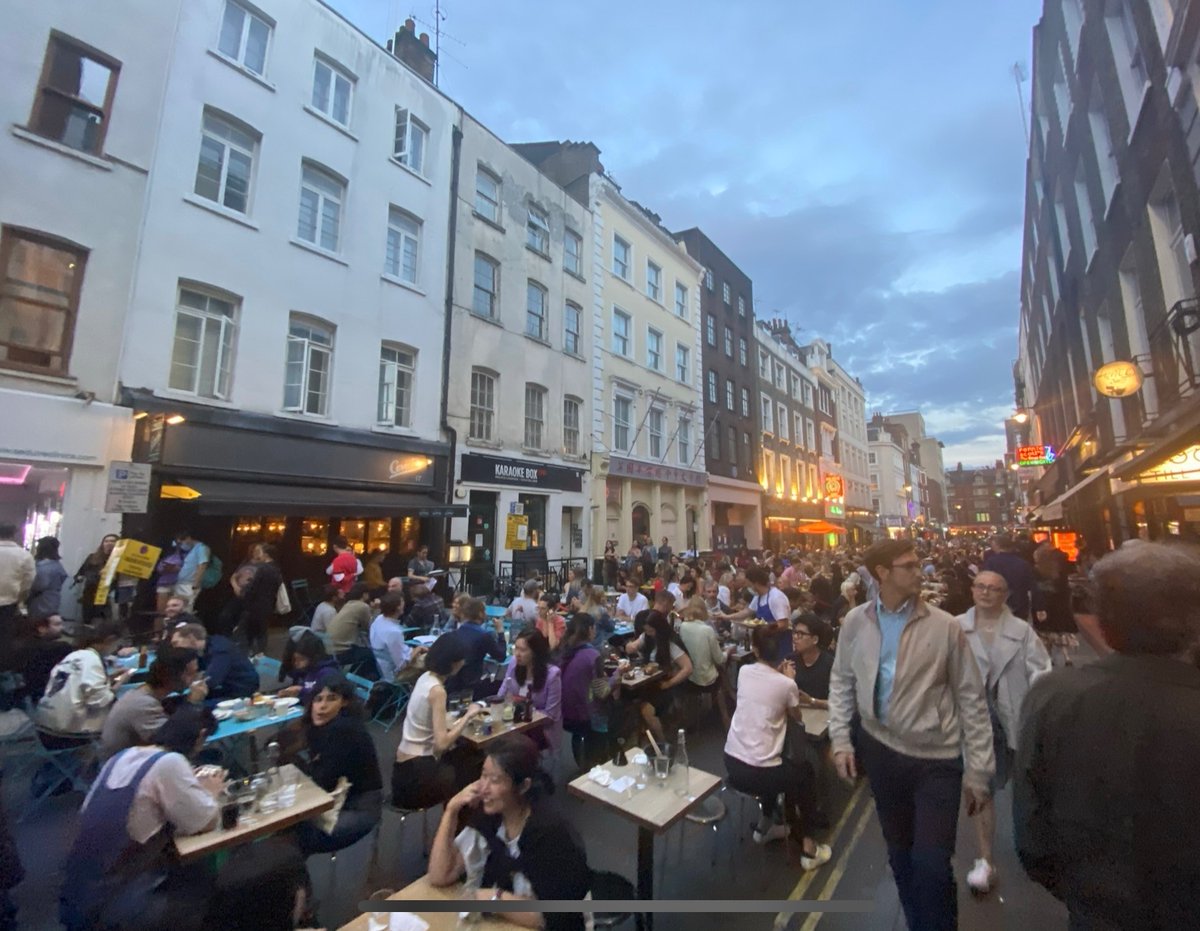josephkazUK's tweet photo. So glad Soho is now open to traffic. Tarmac and cars are just the essence of human connection. Before and after. https://t.co/KFx6J92D8t