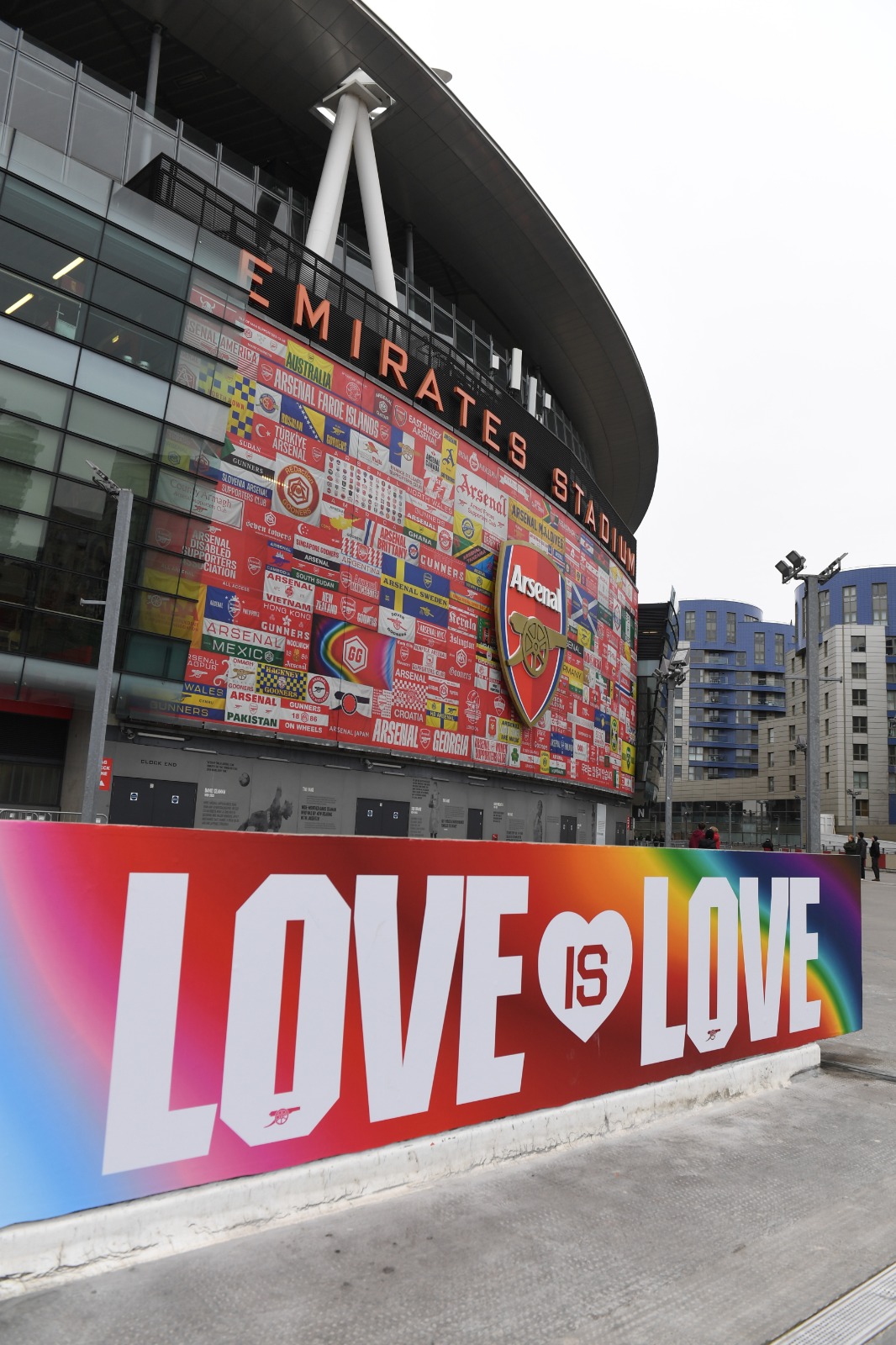 GayGooners Love is Love sign on display at the Emirates