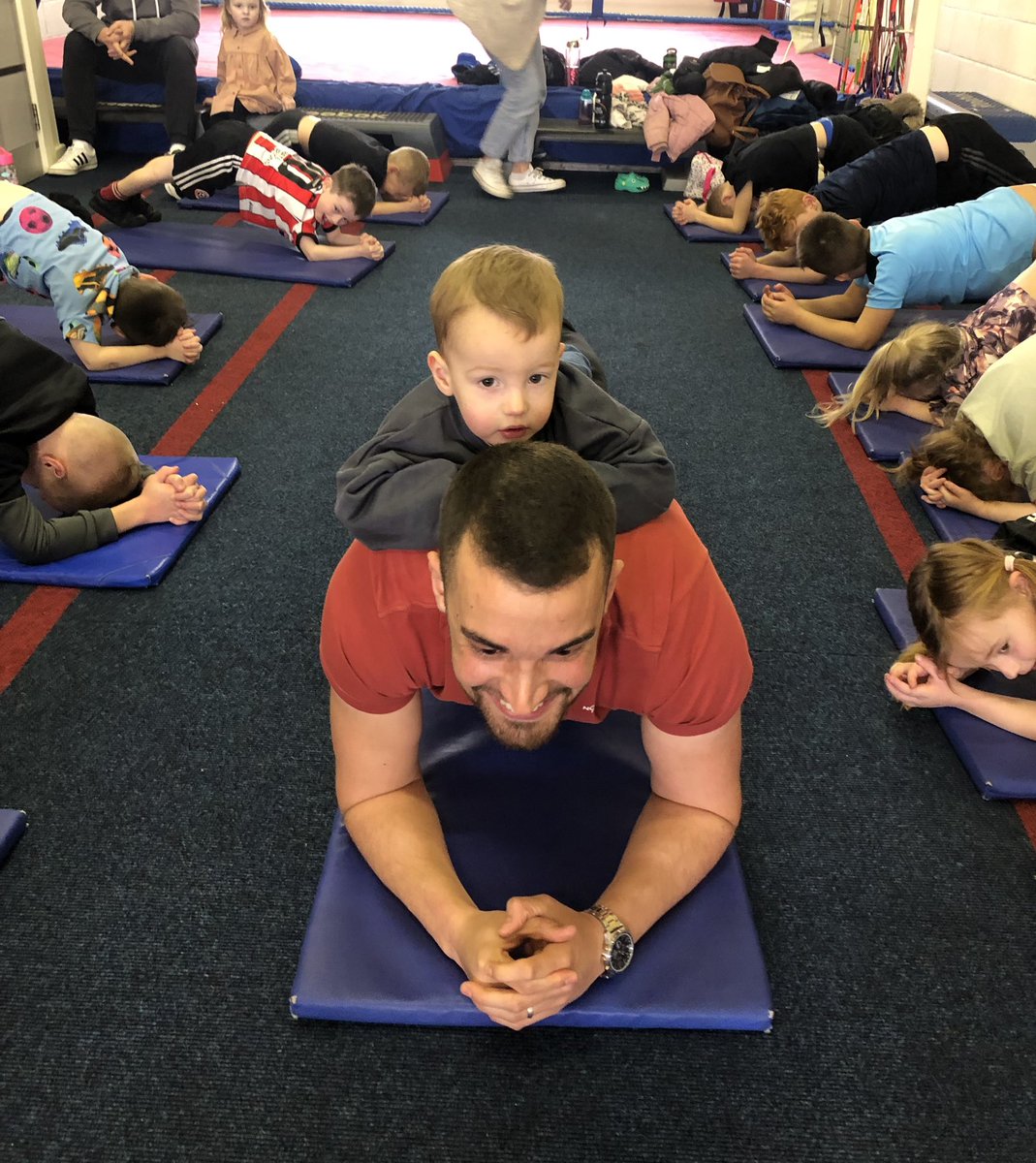 FitFactoryAbc's tweet photo. Our beat the parent competition on a Saturday morning with the little ones is gathering momentum, here’s dad Adam with Buddy on his back competing against the children 🥊 https://t.co/mSRglD1oND
