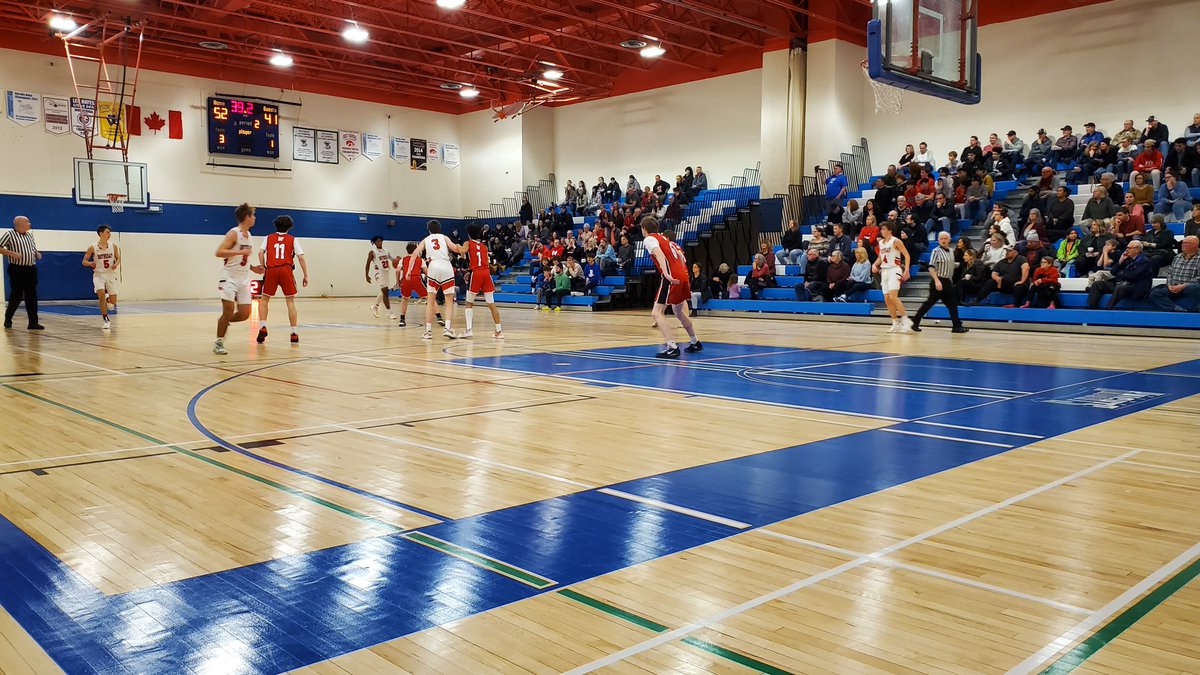 Underdog Saints hanging with the Redhawks in front of loud group of supportive fans. Rothesay leads 52-41 at the half.
