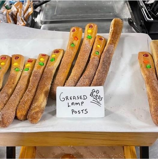 dfallik's tweet photo. Is this peak Philly?  Greased lamp post pretzels. 
(
https://t.co/WLrP4qTnqe https://t.co/Fo34vdswdP
