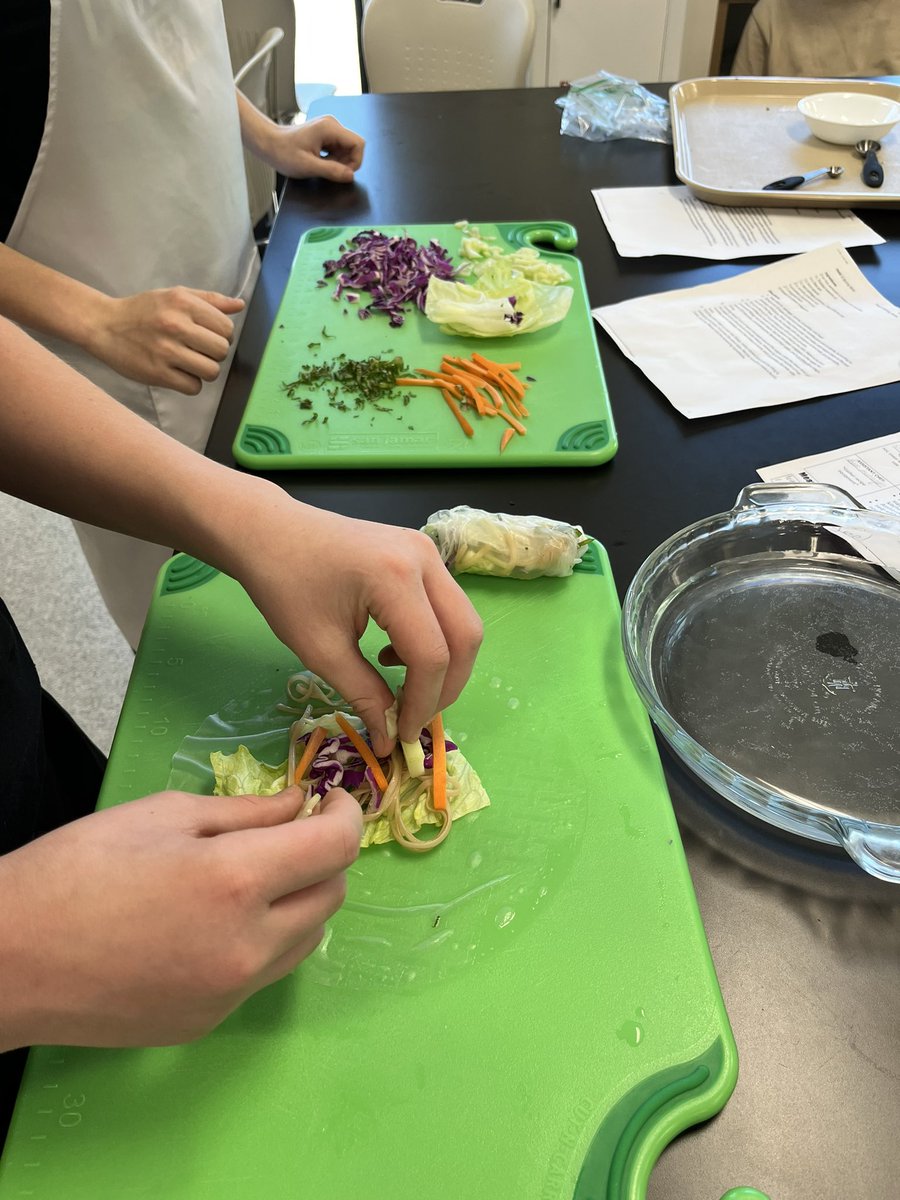 mrsbertroche's tweet photo. A fun week in Culinary 3 working on our knife cuts and making spring rolls! Maybe it will make spring come faster 🤷‍♀️ 🥕 🥒 🍜 🥬 @JohnstonCSD https://t.co/1Lk8Bhjpwo
