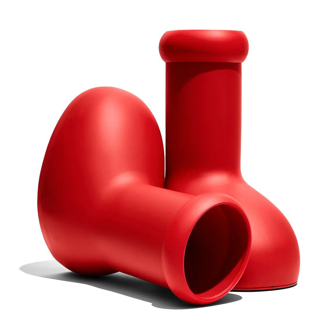SneakerNews's tweet photo. Who's actually planning on copping the MSCHF Big Red Boot? https://t.co/SyEsg3o8TN