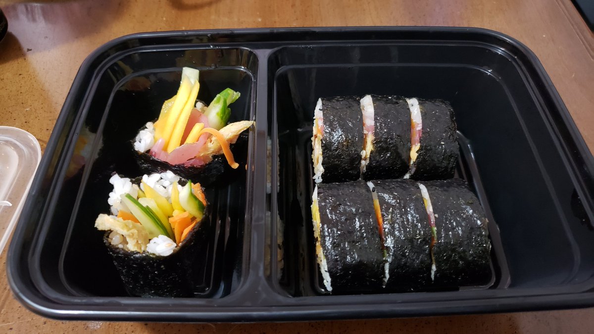 Lexidrawn's tweet photo. Homemade sushi because I'm a masochist. Mine has cucumber, mango, carrot, and sometimes tofu or pickled onions. Allie had steak, egg, onions, and mushrooms https://t.co/c36lxHuRQO