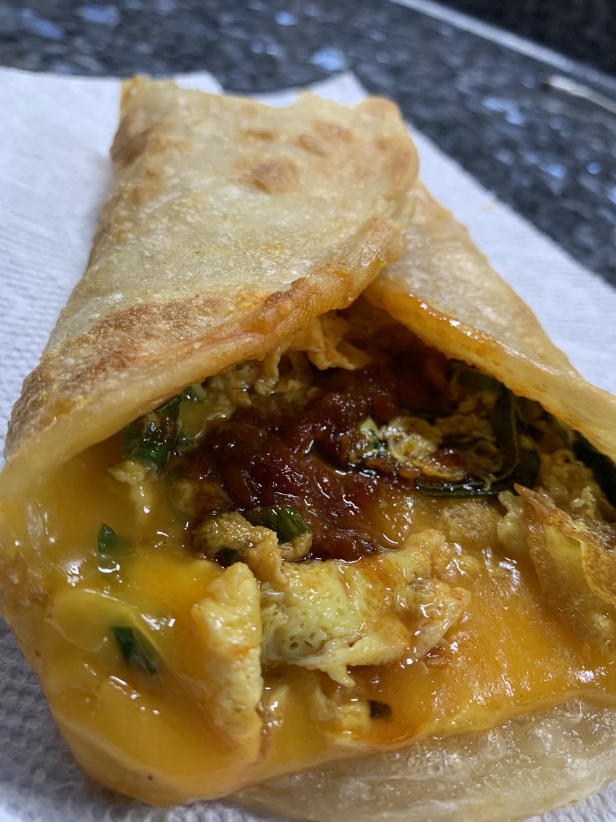 A top 5 breakfast food item in LA! The thousand layer pancake from <a href="/pineandcrane/">Pine & Crane</a> (DTLA); fluffy egg, gooey cheese, chili oil, and Thai basil, all wrapped up in a browned and flaky scallion pancake
