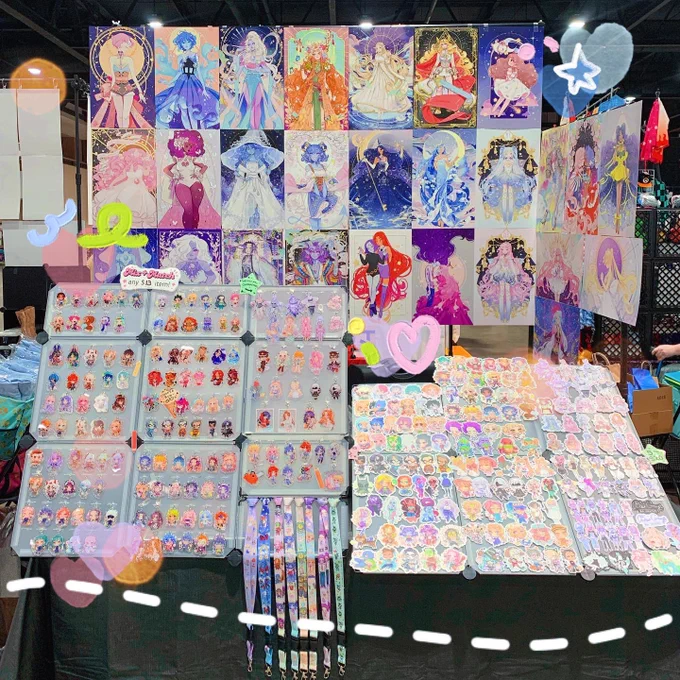 All set up at Kamicon for the weekend! 
If you're in the area come say hi 🌸🌱 I'm at home taking care of the cat but my wonderful gf @deercassette is tabling solo! 