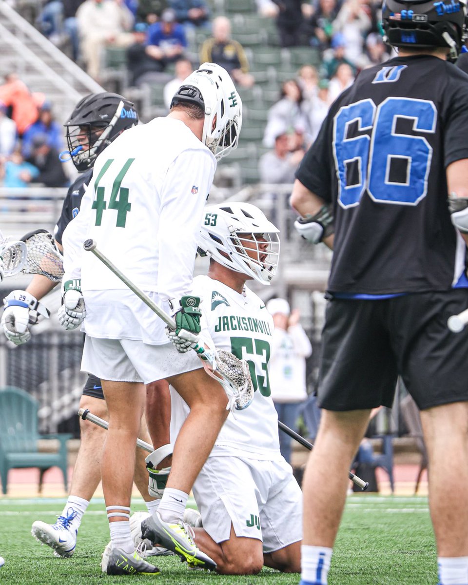 NCAALAX's tweet photo. DOLPHINS MAKE WAVES 🐬 

No. 18 Jacksonville takes down No. 8 Duke, 13-12.

#NCAAMLAX x 📸 @JAX_MLAX https://t.co/0uTUQWh1Ti