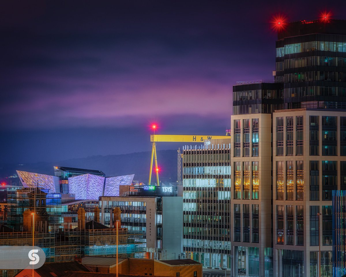 A slightly different view of the Belfast skyline.  Titanic Belfast, Harland and Wolff and Belfast Harbours City Quays. 

#lovebelfast #belfastcity #darkskies #harlandandwolff #visitbelfast #belfastblogger #belfastcityhall #belfastcity  #ExploreBelfast