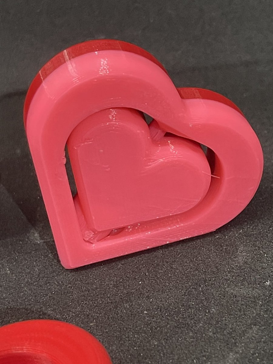 12 down with 14 more to go for my daughters class. A simple remix of the spinning heart pencil topper found on printables, just edited out the words.