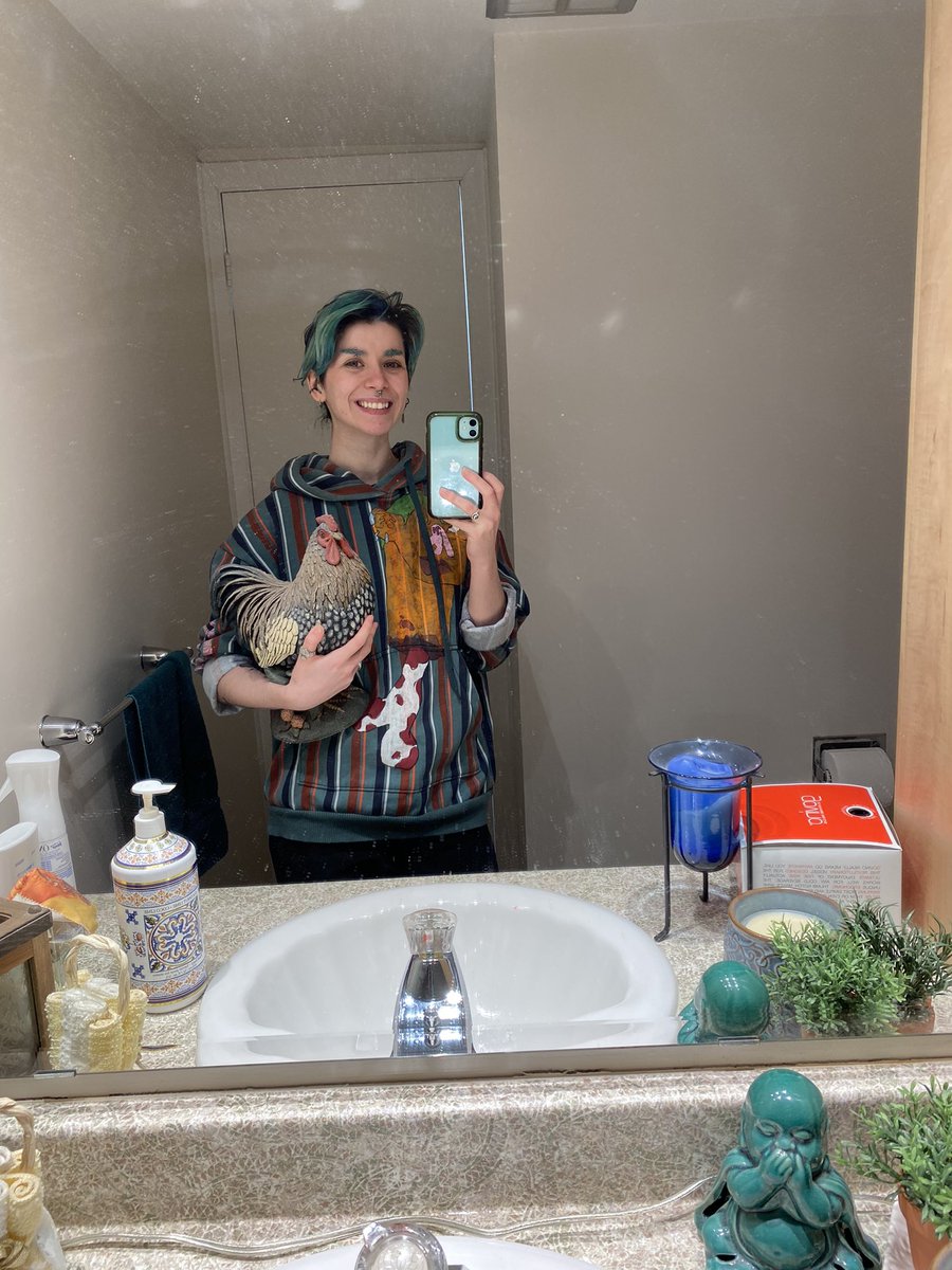 heyitsmothra's tweet photo. My new favourite bit is taking a picture with this chicken at my gf’s grandmas house every time we come over https://t.co/gWsFIPdtsV