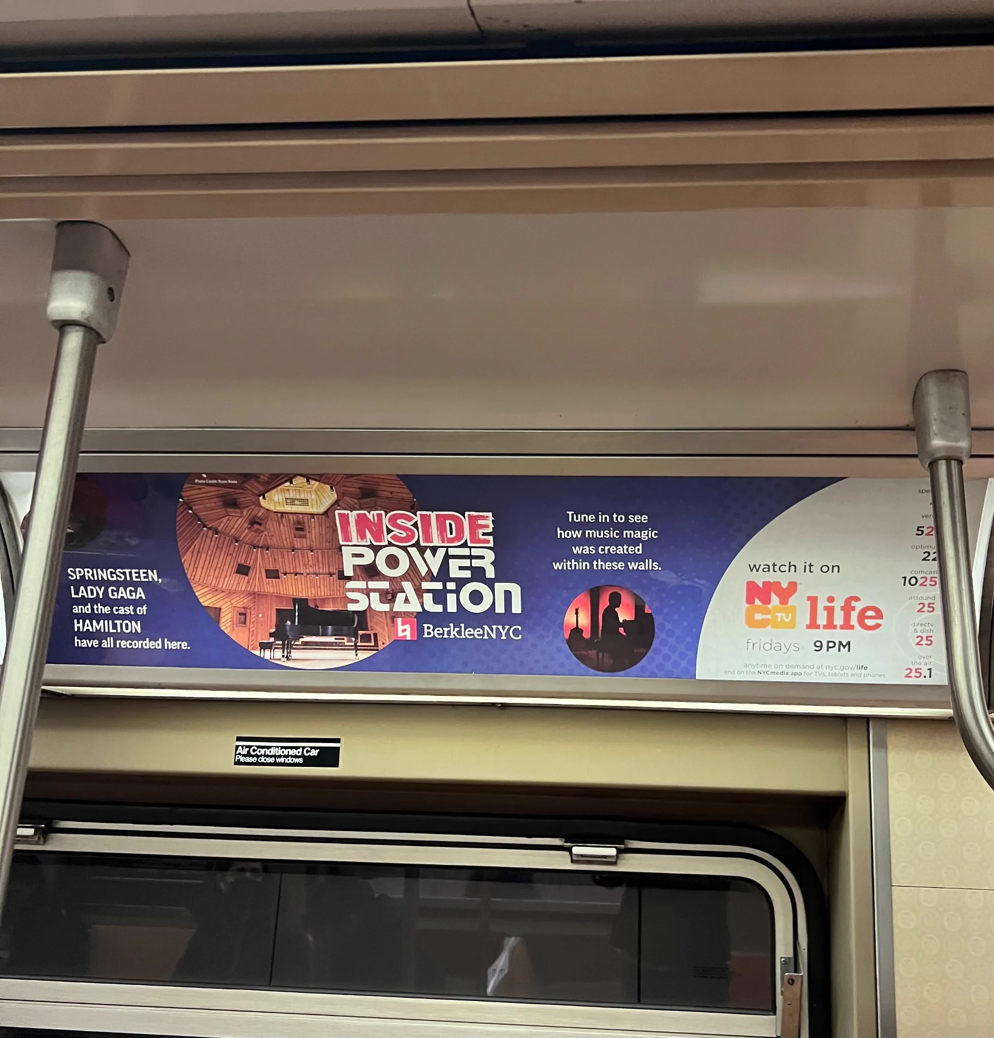 ad inside an NYC subway car featuring a NYC TV (local news) show featuring live musical performances that is using the same font as the micro center logo