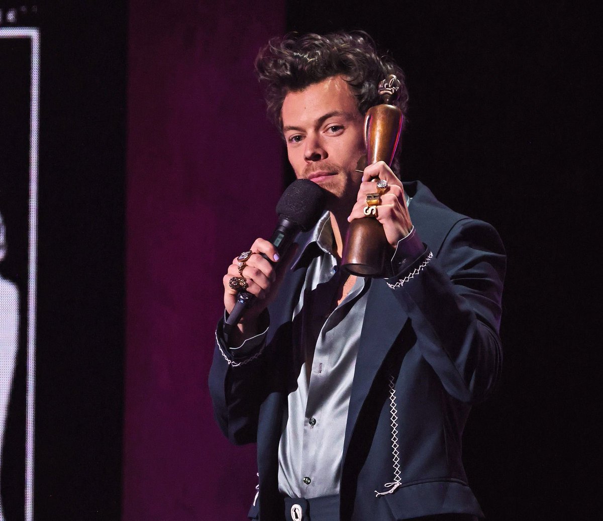 BuzzingPop's tweet photo. Harry Styles is the first male artist in 37 years to win ‘Album of the Year’ at the #Brits and #Grammys in the same year. https://t.co/f59GpwGILa