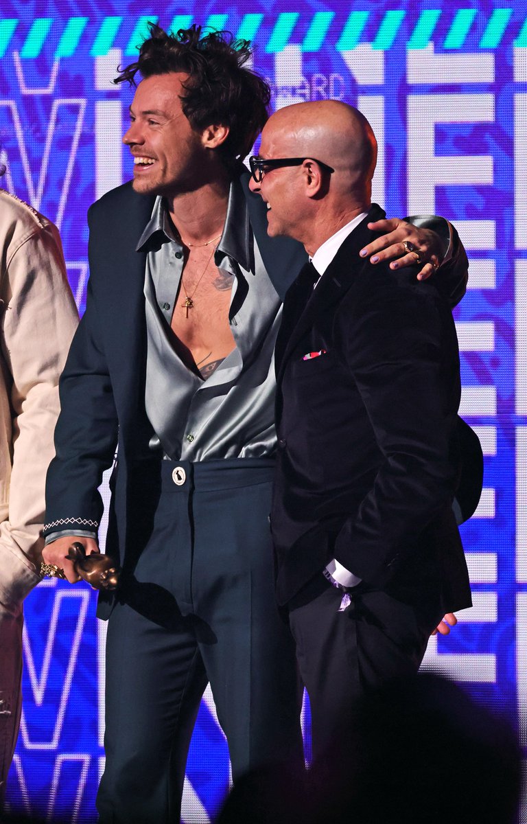 hsdcandids's tweet photo. More of Harry and Stanley Tucci at the 2023 #BRITs in London, England - February 11 https://t.co/x3Rz1EsD78