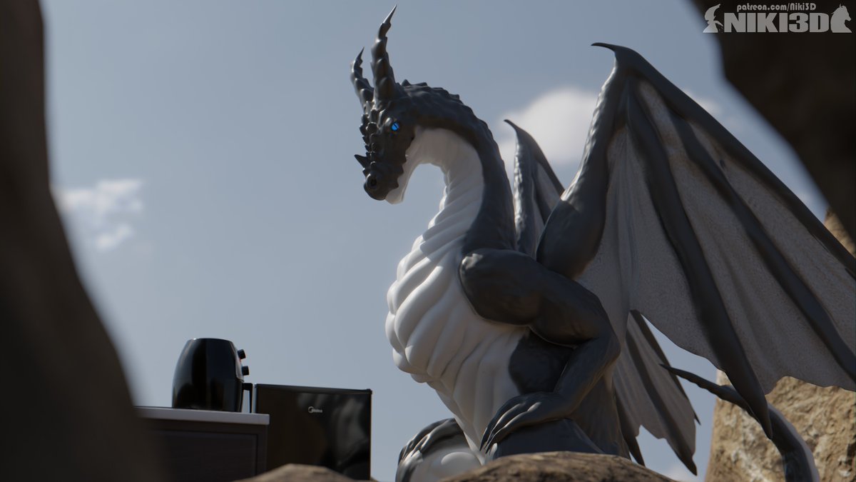 A dragon waiting on chicken nuggs to be done in the air fryer