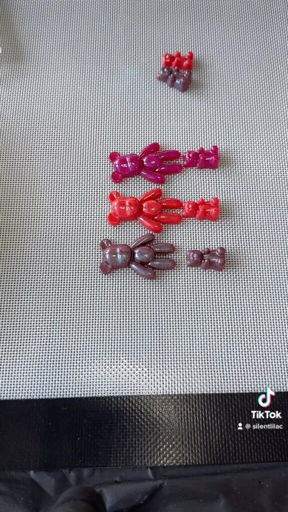 I LOVE these!! Perfectly cured, perfect mold 🥰🥰 So happy! Now, to make keychains with them, maybe with the gummy bear as a charm! #silentlilac #siliconemold #siliconemoldmaking #demold #demolding #demoldingvideo #resinmolds #moldmaking #resinpour #re… instagr.am/reel/Coj4O0kjc…