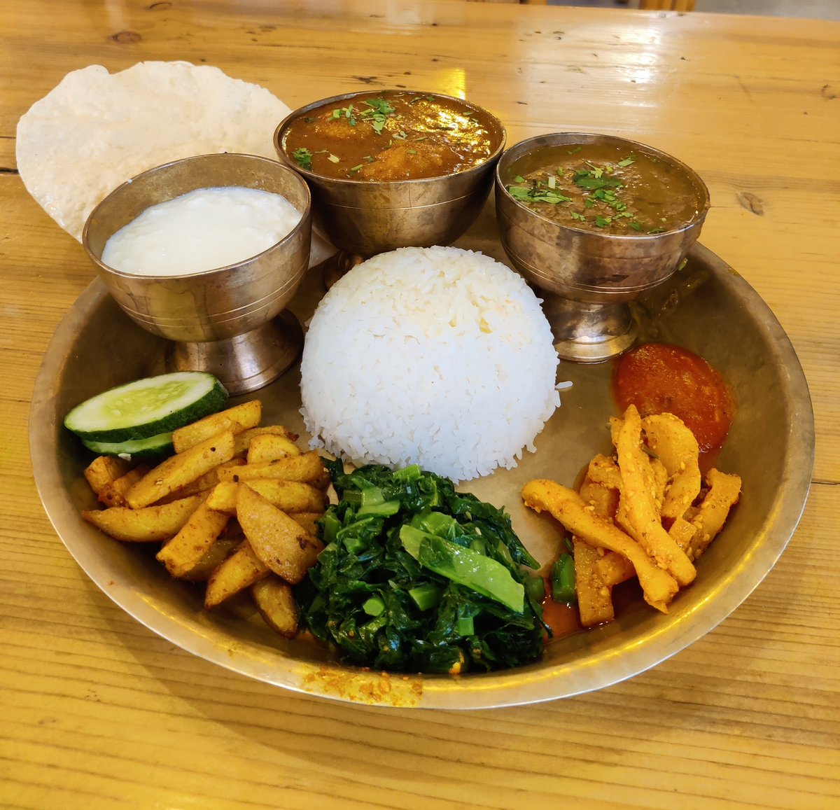 ghatotweets's tweet photo. A self soothing lunch today! Nepali Thakkali at one of the best Nepali restaurants. Saag, radish pickle, aloo fry, Nepali dal, egg curry, papad along with the brilliant tomato chutney made from the peppers of Nepal. 
#food #nepalifood #thali #Bangalore https://t.co/qFVRI40YkK