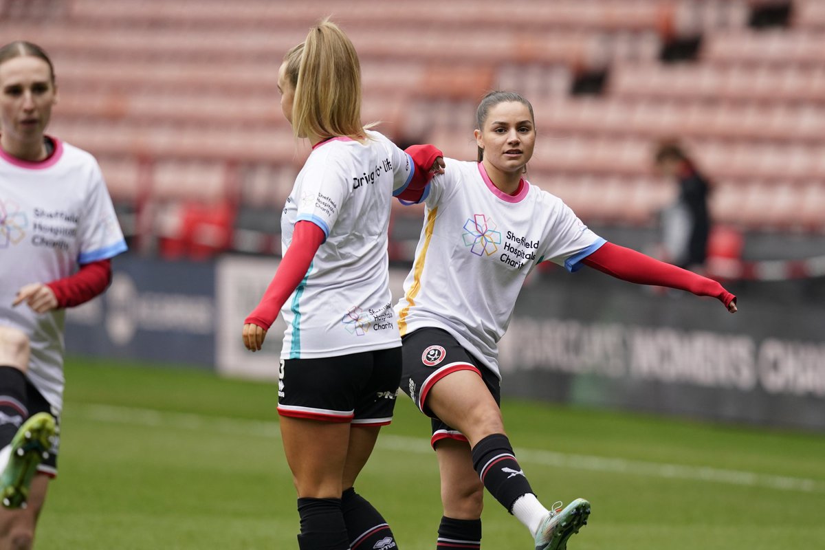 sufc_women's tweet photo. As part of the club's 'United in Love for our NHS' weekend in partnership with Sheffield Hospitals Charity, the Blades are wearing special warm-up t-shirts today. ❤⚔

@SHCFundraising can be found in the main stadium car park for supporters to donate. https://t.co/hZlS4h7krI