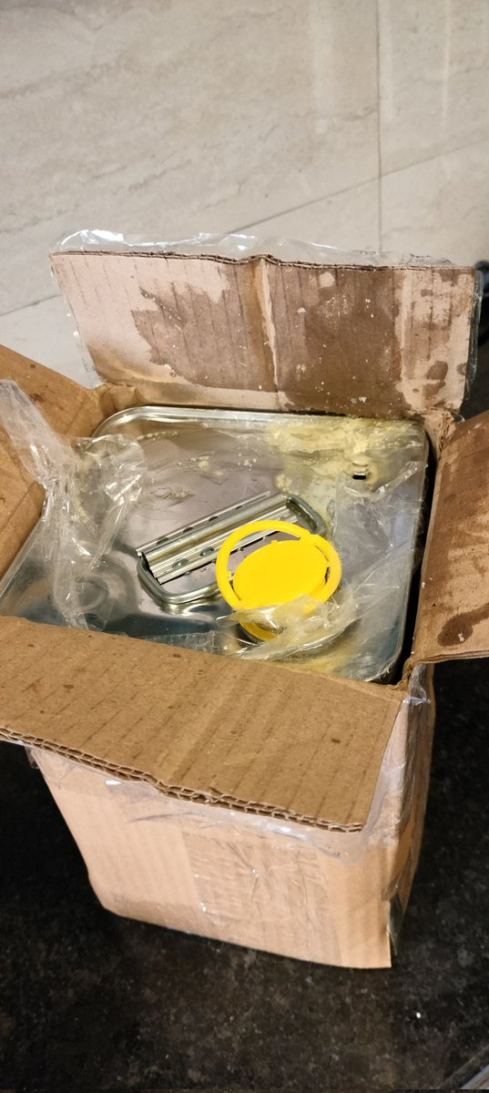 ShamaMittal2's tweet photo. @amazonIN this is the kind of service Amazon gives in India...ghee box is opened already by them..used...spill all over..dmdxagent says it is not yet delivered. https://t.co/wFjX9b39z8