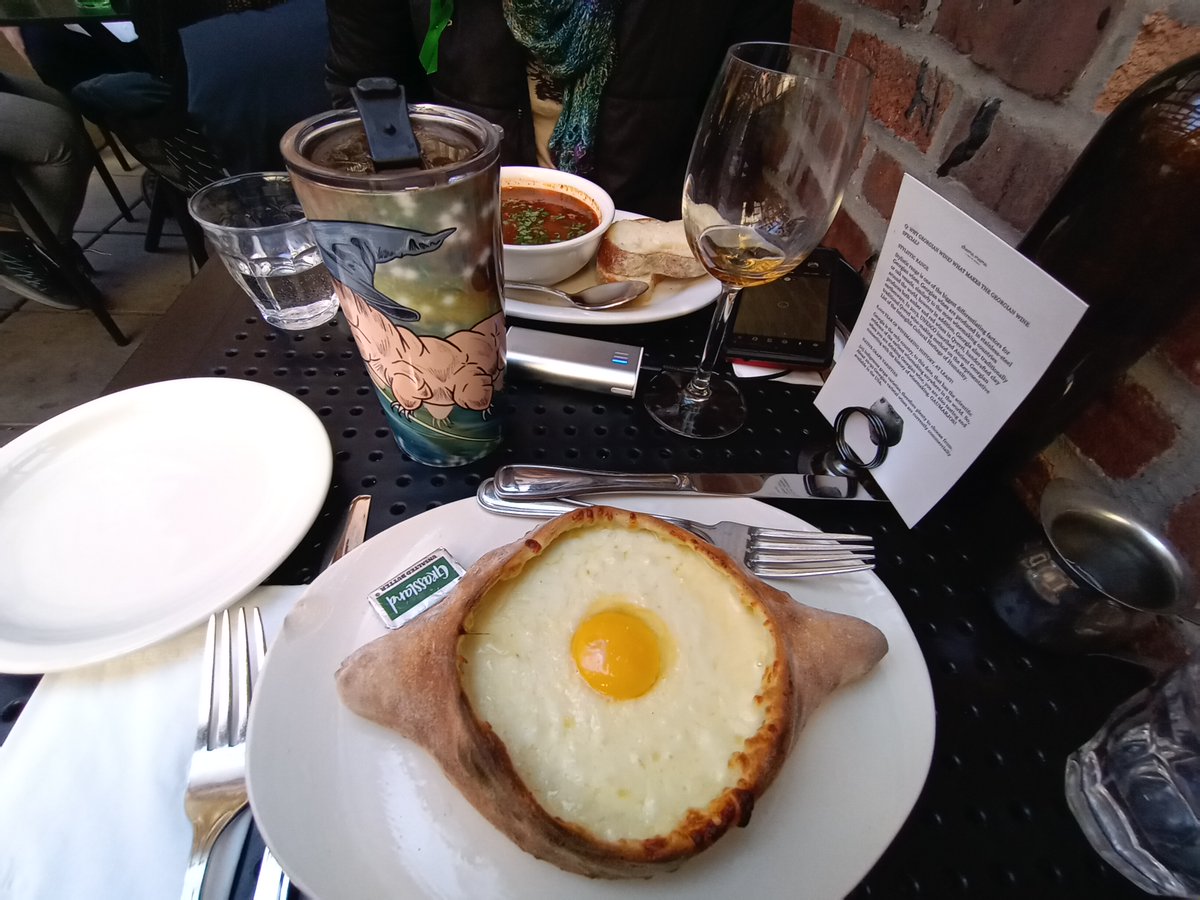 BuckyKatt's tweet photo. Great to meet longtime Twitter pal (& fellow #MarchMammalMadness fan) @sm9eb in person yest. in NYC! We had brunch at a Georgian restaurant, where I ate Adjaruli Khachapuri, an amazing concoction of cheese, bread, egg & butter. In true #2023MMM form, #TardiGandalf was present. https://t.co/nJ2fqlzddX