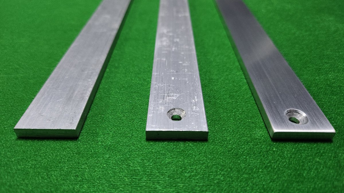 Our aluminium bars start off as raw stock cut to size, we then CNC machine the holes in the correct location then use a 2 stage brushed finishing system to apply the smooth brushed finished. All of this is done in house by our team.