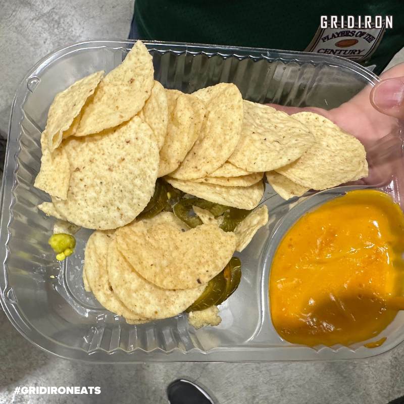 Gridiron's tweet photo. Are these Nachos at the #SuperBowl worth $11? 😂

#SBLVII | #GridironEats https://t.co/vVxI5rjpBc