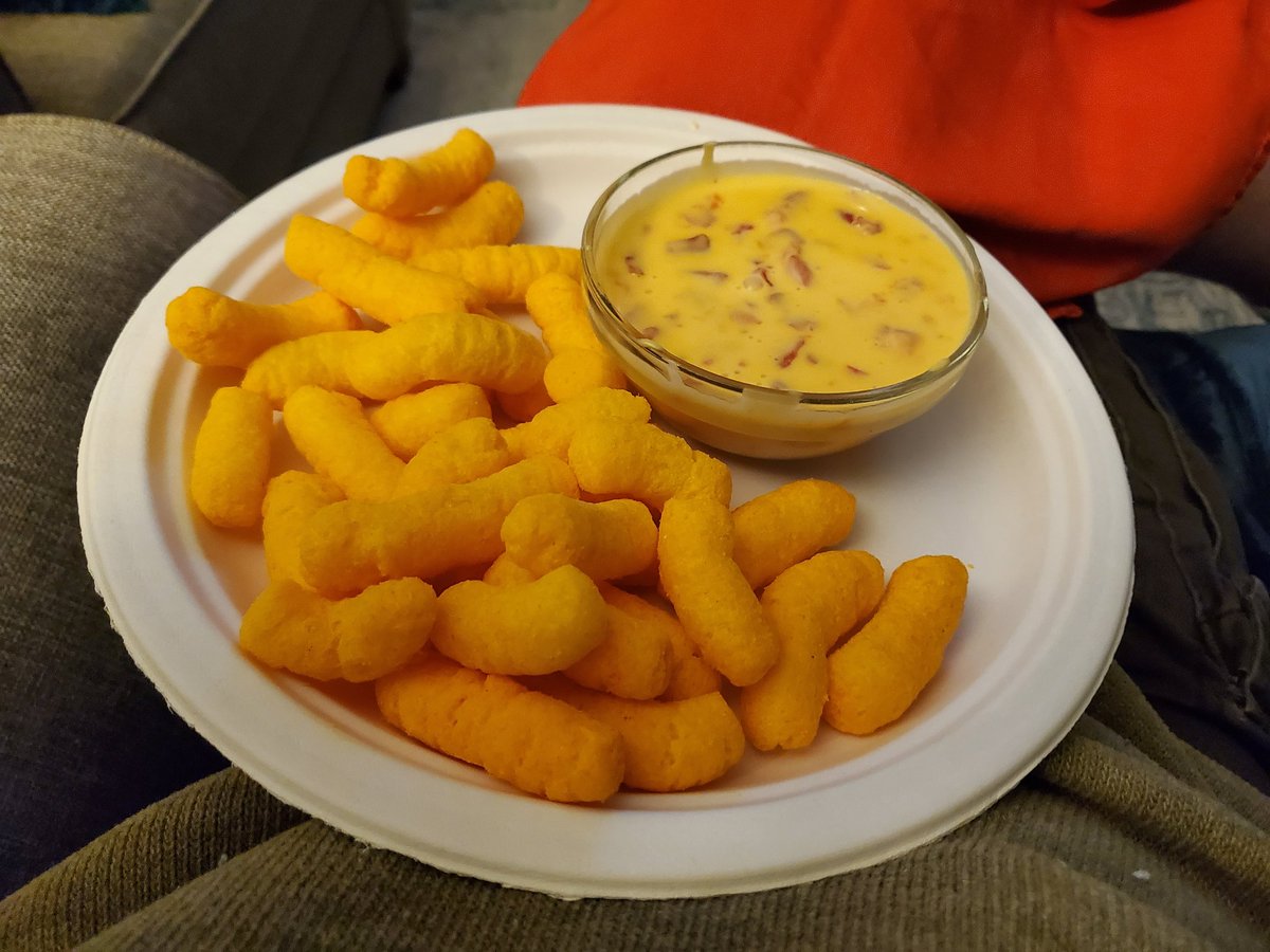 The best #SuperBowl snack is most definitely cheesey poofs dunked into Velveeta + Rotel cheese dip.