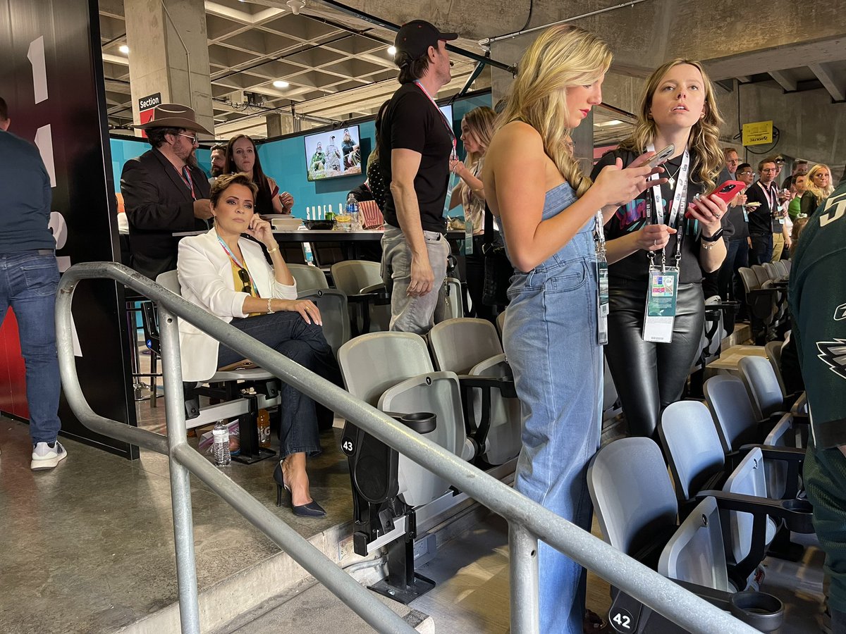 bennyjohnson's tweet image. The @NFL played two different “National Anthems” tonight. Someone just sent me a photo of @KariLake sitting during the first one.