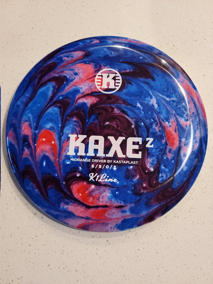 ccMecham's tweet image. First crack at a DG dye job. Used ProChem dye in a clear glue bed with a heat lamp. Can definitely get better, but it's not so bad. #discgolf #discdyeing #kastaplast