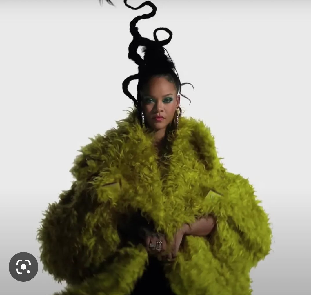 Everyone ready for Rhianna Loohoo in her Grinch skin coat? #SuperBowl