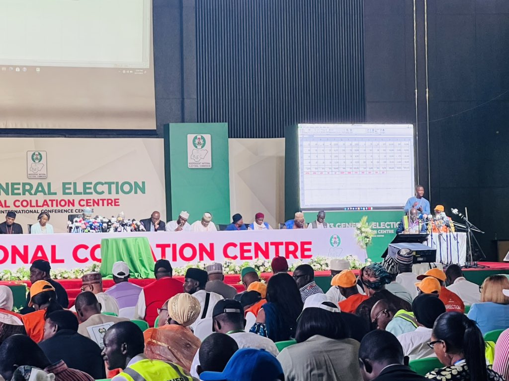 inecnigeria's tweet photo. Activities have resumed at the National Collation Centre, Abuja. The Collation Officers for Kwara and Ondo States have just presented their Presidential Election results.
#NigeriaDecides2023 https://t.co/L7YolMTgoe