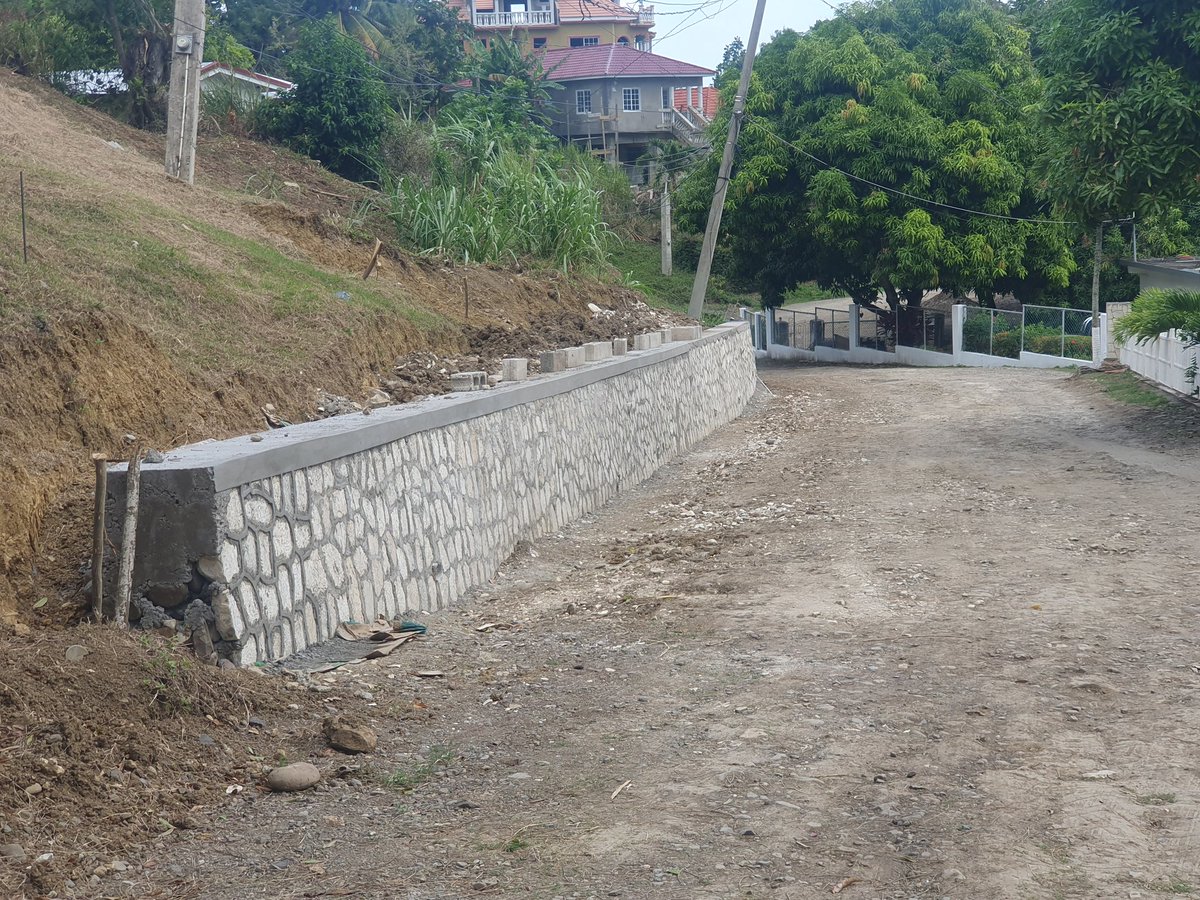 DrNormanDunn's tweet image. #WorkUpdate: The retaining wall in the Iterboreale Housing Scheme has been completed. Work to repair the road surface will begin soon! #MPDunnAtWork