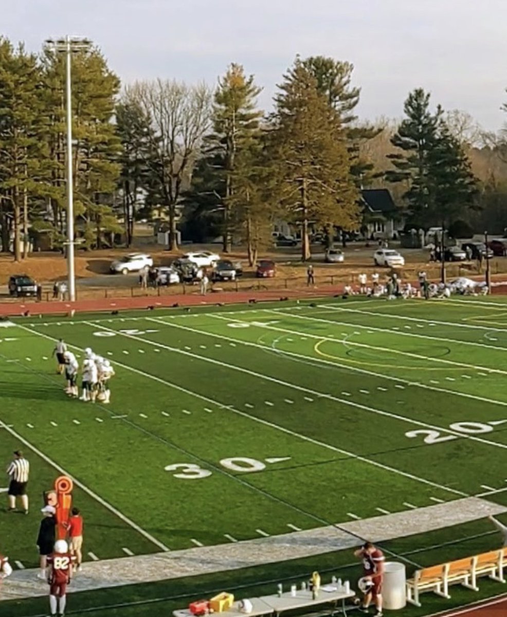 stfalconer's tweet photo. @newftbj In Northbridge the fans found a loophole to MIAA COVID restrictions on the number of spectators allowed by creating a tailgate section just beyond the fence at Lasell field. Wish I had a better pic of the number of cars there for our opening game under the lights in early March! https://t.co/Oym9xDXFvb