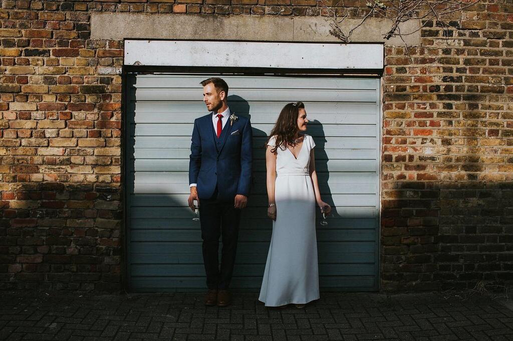 Laura+Steve at Islington Town Hall / London. 🖤🔥
.
.
.
.
.
#london #wedding #alternativebride #alternativeweddingphotographer #portraitcollective #weheartpictures #thatsdarling #lookslikefilm #sayidoislington #londonbride  #freepeoplewedding  #exfilm … instagr.am/p/CpKsLdesy4o/