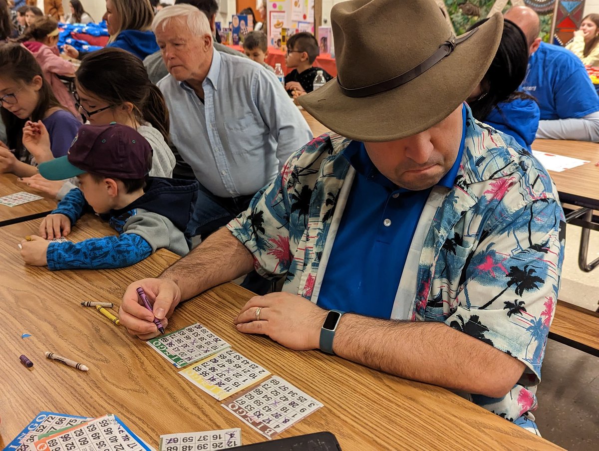 mbraham's tweet photo. Where else but elementary school can you find 🤠cowboy hats and 🖍️crayons at a BINGO game? #K12 #SchoolLife #PTAfun https://t.co/BSnUcoQbu2