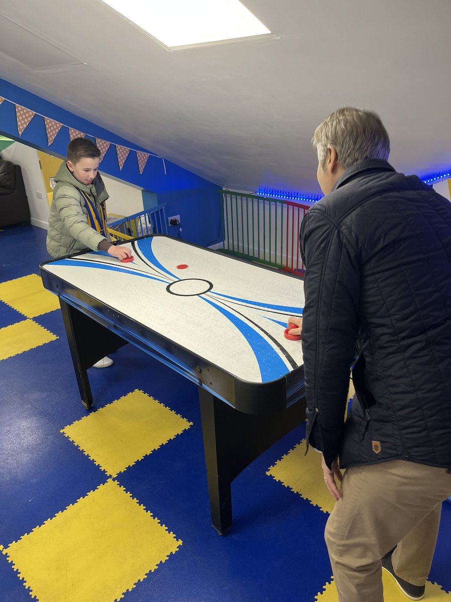 An intense game of air hockey in the family room today! 🥅🏒