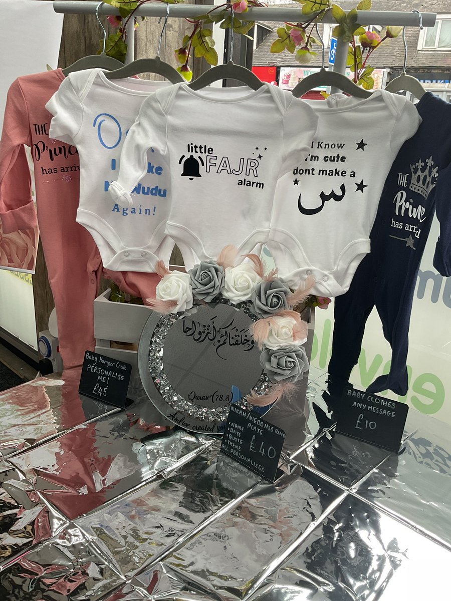 Baby clothing with personalised text available in store