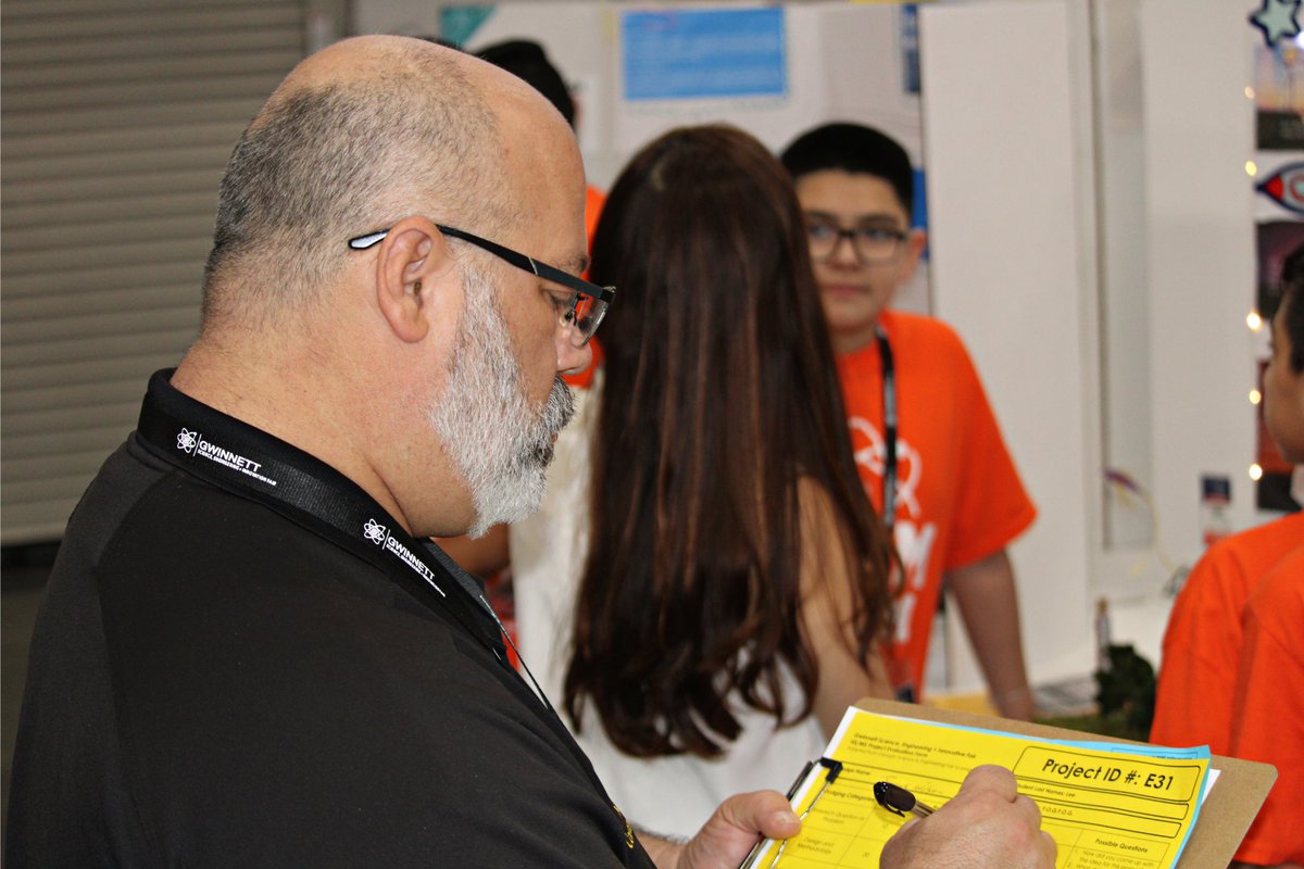 GwinnettSO's tweet photo. Deputy Perez and Deputy Wilson participated as judges on behalf of the Sheriff's Office for the Gas South Arena's 2023 Gwinnett Regional Science, Engineering, and Innovation Fair. Our deputies enjoyed connecting with the students of Gwinnett County! #GoGCSO https://t.co/iXzoJzBoTu