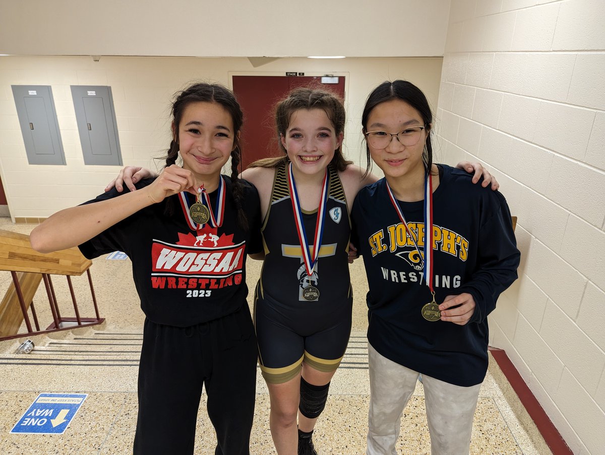 Hannah King, Cecilija Meglic, Alex DiCristiforo, all WOSSAA gold medalists and Helen King with silver, will represent @SJHS_RAMS at @OFSAAWrestling, March 7-8, in Ottawa. (photo Hannah, left, and Cecilija, right, with @CECITitans' Kailey Beauchamp)