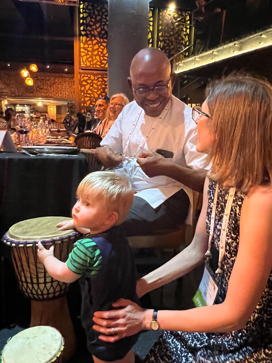 The youngest and most enthusiastic drummer at the wonderful #ICHG2023 dinner - lucky enough to get a personal tutorial from Charles Rotimi!