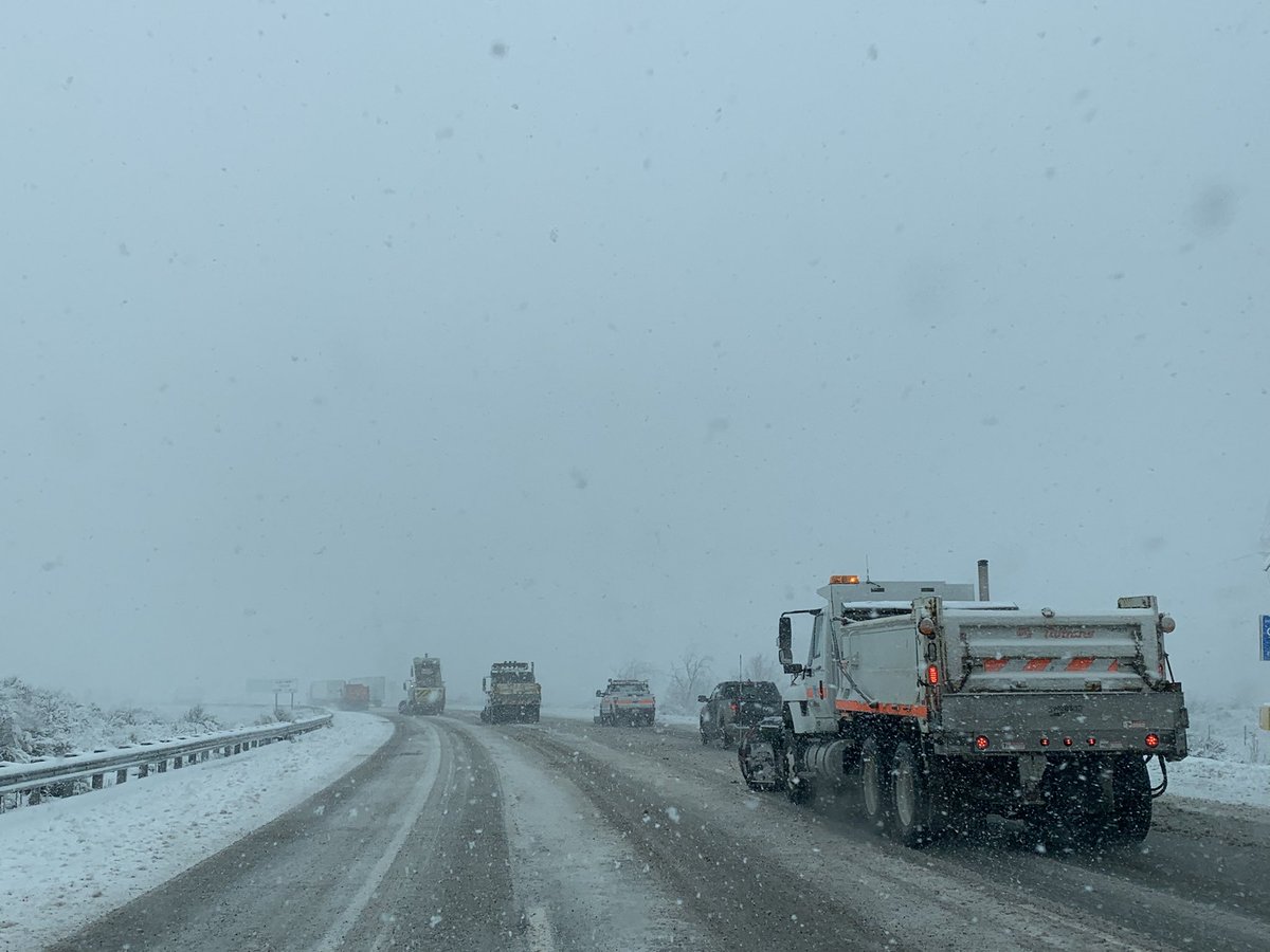 Caltrans8's tweet photo. I-15 in the Cajon Pass is no joke right now. Best to stay off the roadway if able. We have plows working in tandem to clear the roadway. Give us room to work. #Caltrans8 https://t.co/v18B2oLDaM