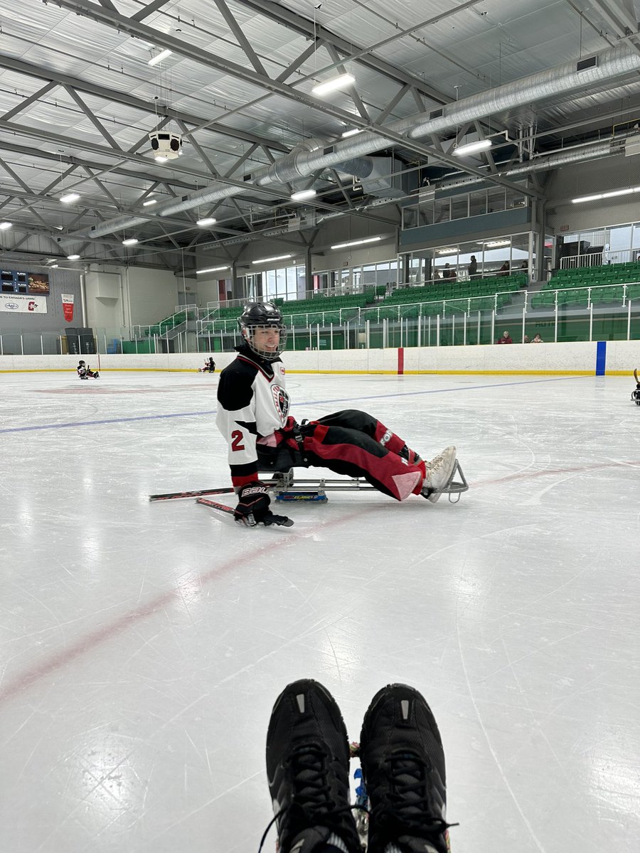 Got in a sled at SledgeHockey practice today just so Sam could knock me over a few times…..